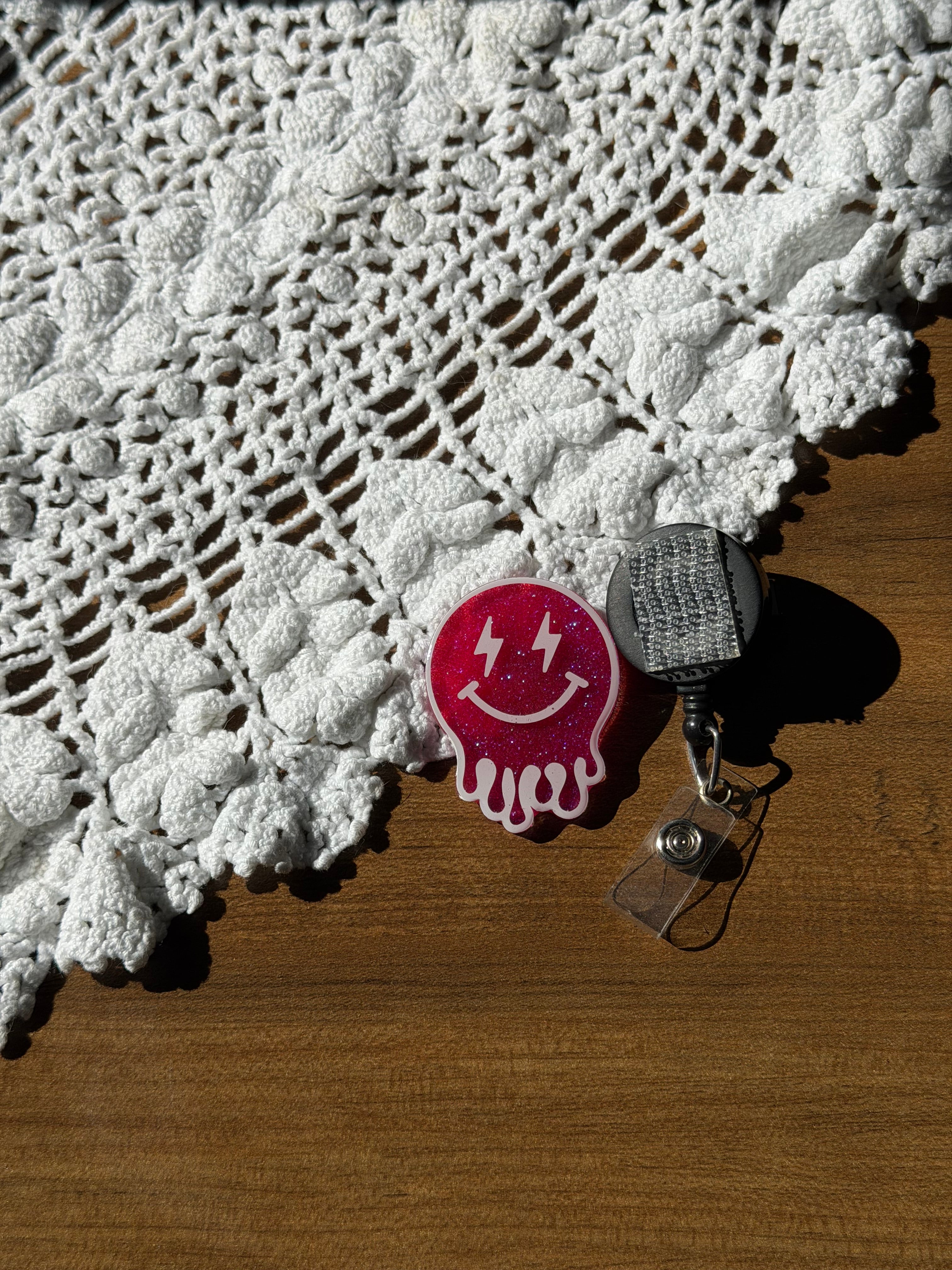 Pink Droopy Smiley Badge Reel