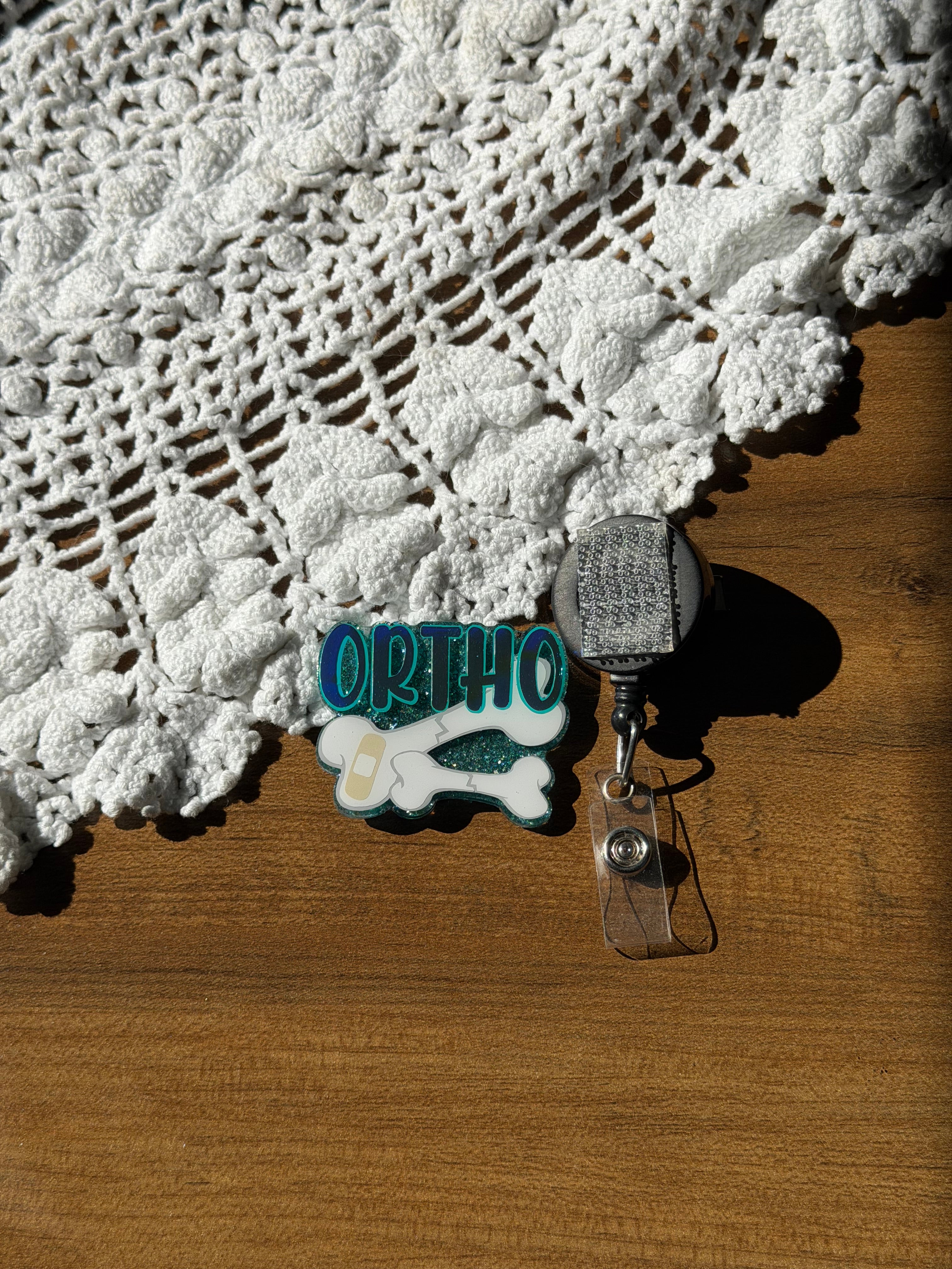 Ortho (teal) Badge Reel