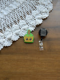 Carmel Apple Badge Reel