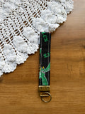 The Green Team Wristlet w/ Bronze Keychain