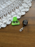 Green science guy Badge Reel
