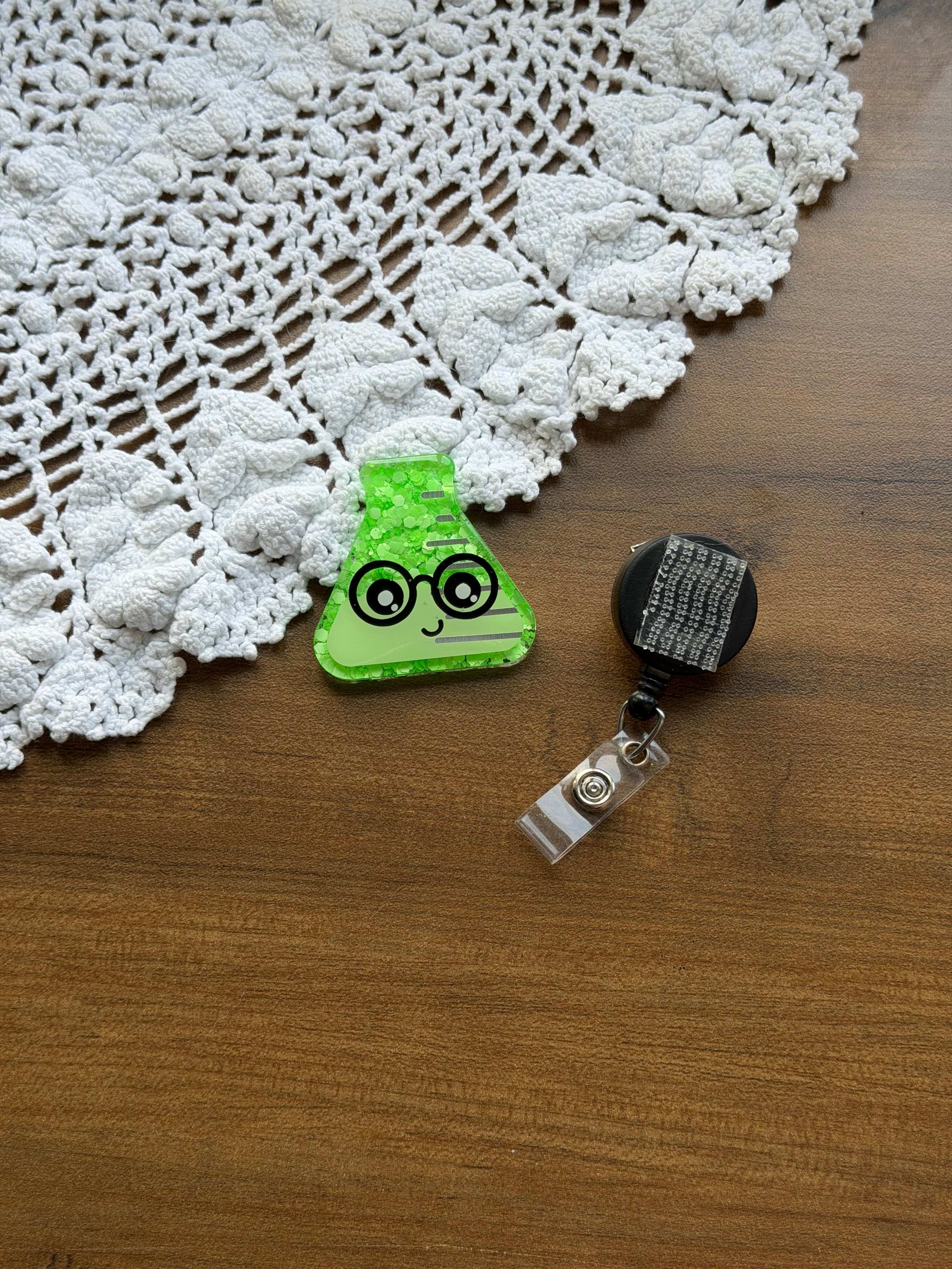 Green science guy Badge Reel