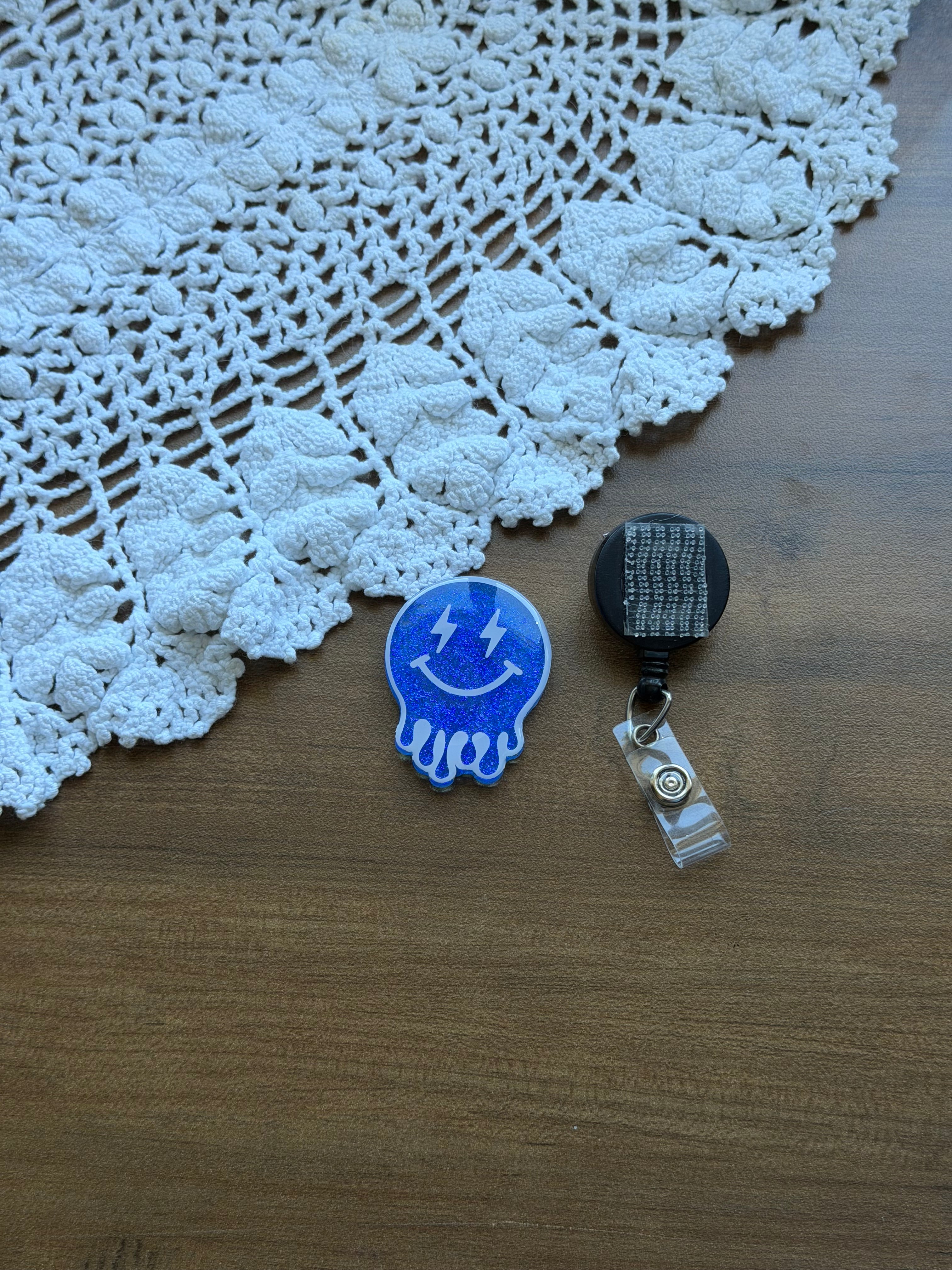 Blue Drippy Smiley Badge Reel