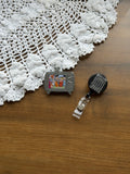 Flinestones Badge Reel